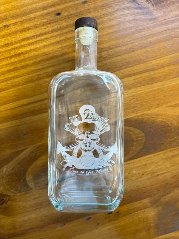laser engraved glass liquor bottle
