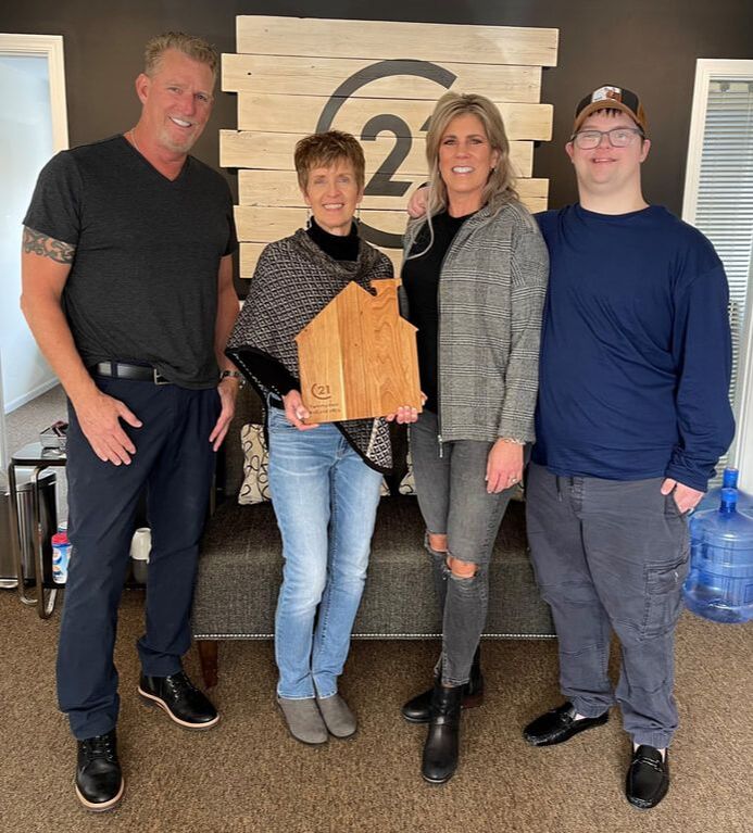 Richie and Jimmy Chapman deliver laser engraved cutting boards to Century 21