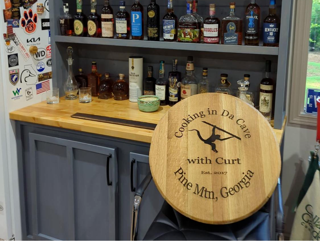 decorative whiskey barrel lid for a man cave