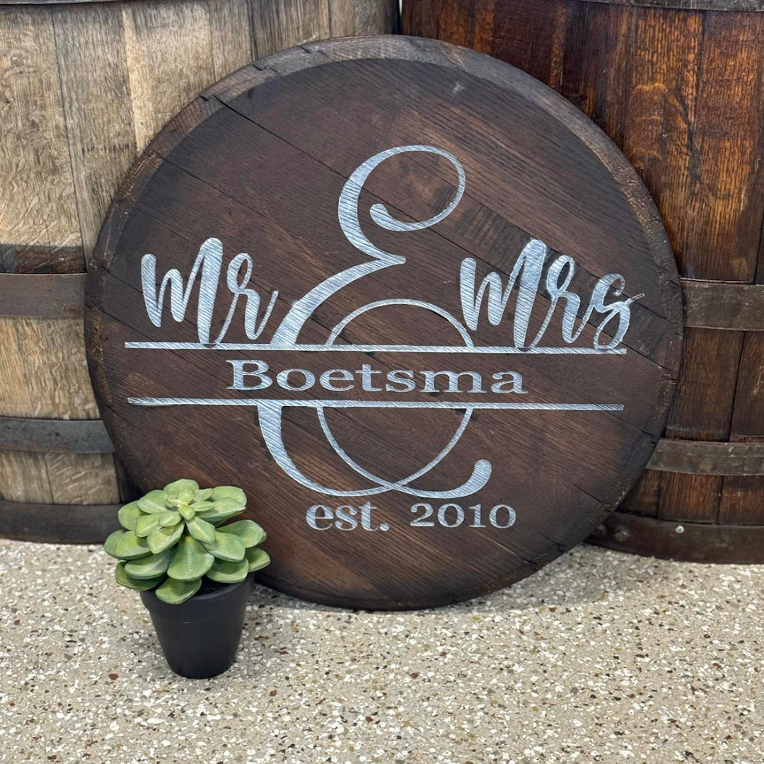 personalized Mr. and Mrs. whiskey barrel head